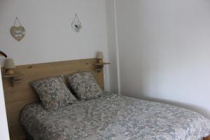 Postel nebo postele na pokoji v ubytování Le Moulin Traffay