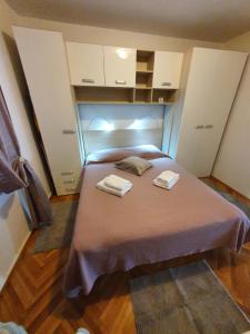 Postel nebo postele na pokoji v ubytování Apartman Stela