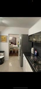a kitchen with stainless steel appliances and a dining room at La Suite in Baden-Baden +109 photos