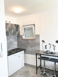 Kuhinja ili čajna kuhinja u objektu Studio Apartman Bruna-Liznjan, Medulin