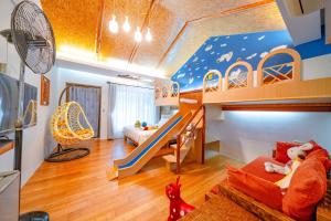 Postel nebo postele na pokoji v ubytování Rainbow Garden B&B