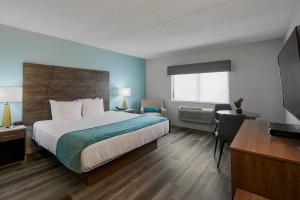 Postel nebo postele na pokoji v ubytování Hotel Wave at Rehoboth Beach + 17 fotografií