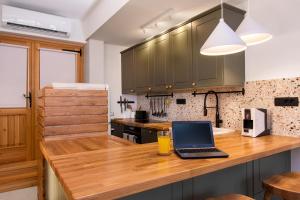 Kuchyň nebo kuchyňský kout v ubytování Apartments Kantunal