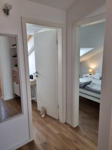 Postel nebo postele na pokoji v ubytování Geek Apartment