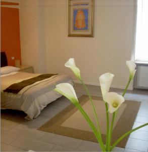 Voodi või voodid majutusasutuse Agorà Residenza toas