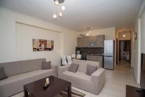 Kuchyň nebo kuchyňský kout v ubytování Lagaria Apartments