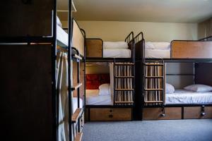 Postel nebo postele na pokoji v ubytování KEX Hotel