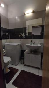 Et badeværelse på Apartment Sidro