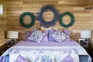Voodi või voodid majutusasutuse Dungeness Bay Cottages toas