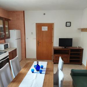 Kuchyňa alebo kuchynka v ubytovaní Apartmani Origo
