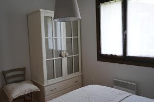 Łóżko lub łóżka w pokoju w obiekcie Apartamento con jardín en la Cerdanya