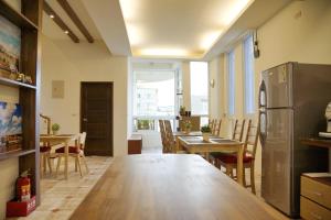 A cozinha ou kitchenette de 輕旅小站 Soft Travel Hostel