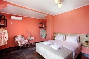 Posteľ alebo postele v izbe v ubytovaní CONTE CRISTO Suites