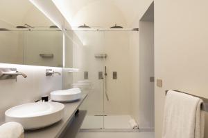 Koupelna v ubytování Ramo d'Aria Etna Boutique Hotel + 37 fotografií