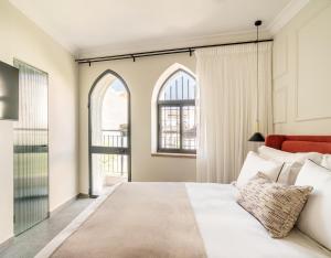 Rúm í herbergi á Albi Boutique Hotel - Traveler's Choice 2024
