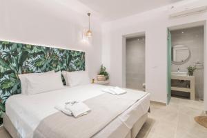 Posteľ alebo postele v izbe v ubytovaní Suncourt Lux Rooms