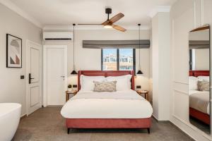 Rúm í herbergi á Albi Boutique Hotel - Traveler's Choice 2024