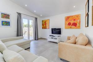 TV a/nebo společenská místnost v ubytování Villa Zaragoza by Villa Plus