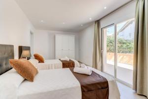 Postel nebo postele na pokoji v ubytování Villa Zaragoza by Villa Plus + 12 fotografií