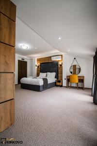 Postel nebo postele na pokoji v ubytování Hotel Kirkovo