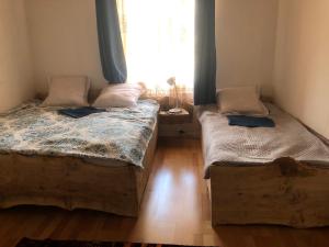 Postel nebo postele na pokoji v ubytování Homok Kincse