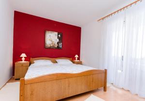 Postel nebo postele na pokoji v ubytování Apartments Damir