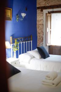 Postel nebo postele na pokoji v ubytování Hotel Rural El Zaguán