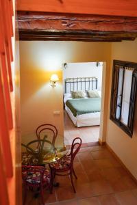 Postel nebo postele na pokoji v ubytování Hotel Rural El Zaguán