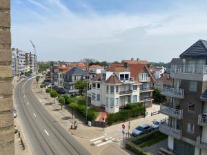 an aerial view of a city street with houses at Happy stay by Anaïs - 20m to beach in De Panne