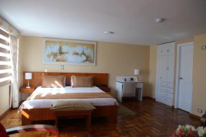 Letto o letti in una camera di Hotel Carolina Montecarlo