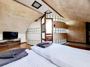 Posteľ alebo postele v izbe v ubytovaní OASIS APARTAMENT GIŻYCKO