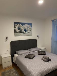 Posteľ alebo postele v izbe v ubytovaní Apartment & Rooms - Marina