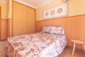 A bed or beds in a room at Casa Adrimar