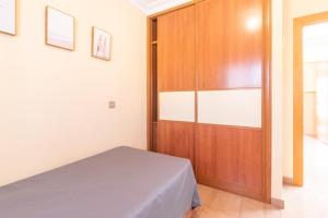 A bed or beds in a room at Casa Adrimar