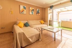 A bed or beds in a room at Casa Adrimar