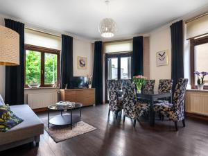 Posedenie v ubytovaní CracWoW VIP Apartment