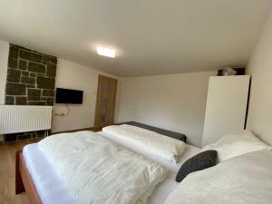 Postel nebo postele na pokoji v ubytování Apartmán Na Rozcestí Třeboň