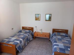 Posteľ alebo postele v izbe v ubytovaní Casa Romeo