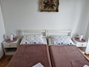 Postel nebo postele na pokoji v ubytování Apartman Mataija