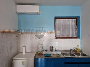Kuchyň nebo kuchyňský kout v ubytování Apartman Mataija