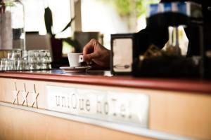 Nápoje v ubytování Unique Hotel