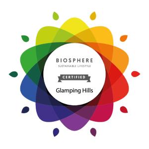 a colorful ribbon with the colors of the rainbow at Glamping Hills in Santa Comba de Rossas