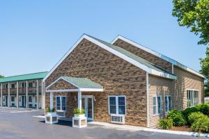 an image of a building at a school at Sunbird Cape Cod Resort in West Yarmouth
