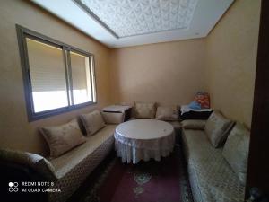 Istumisnurk majutusasutuses Appartement à Bouznika prêt du plage Dahomey, plage bouznika, Bahia beach