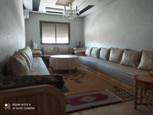 Istumisnurk majutusasutuses Appartement à Bouznika prêt du plage Dahomey, plage bouznika, Bahia beach