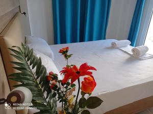 Postel nebo postele na pokoji v ubytování KELLY APARTMENTS