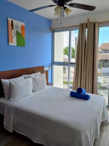 Säng eller sängar i ett rum på Cozy and spacious apartment by Tulum 10