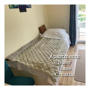 Krevet ili kreveti u jedinici u objektu Apartments BISER