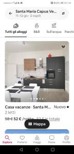 ein Screenshot einer Küche mit einem Bild eines Zimmers in der Unterkunft Casa di Aisha in Santa Maria Capua Vetere