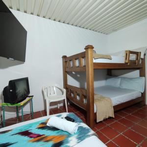 Divstāvu gulta vai divstāvu gultas numurā naktsmītnē Hosteria De Mi Pueblo